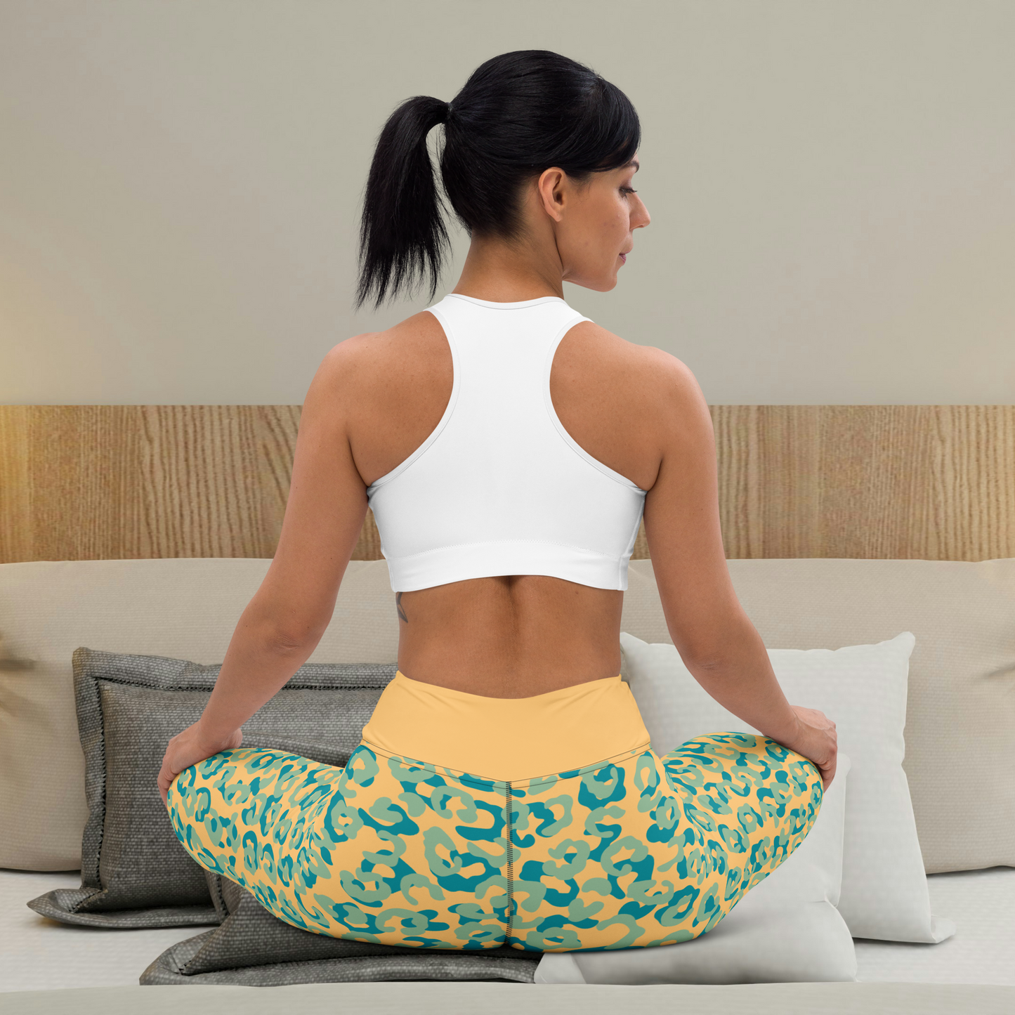 Orange and teal athletic women’s yoga leggings.