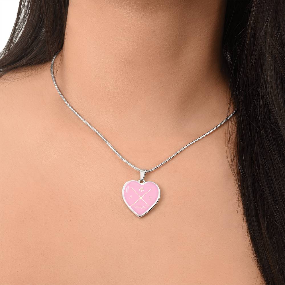 Collier coeur en acier argenté ou doré.