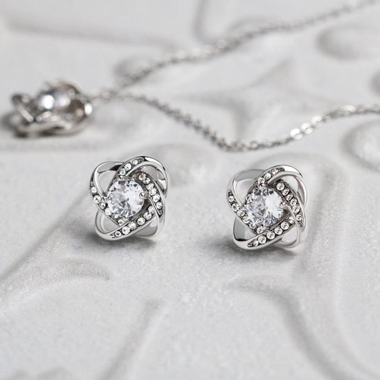 Atom knotted jewelry set of 14k white gold and cz.