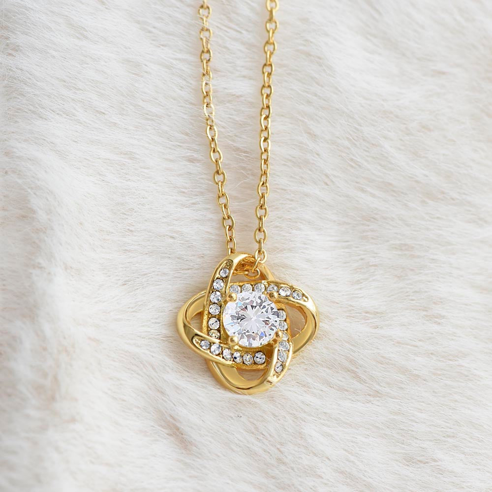 Atom knotted 14k white or 18k yellow gold finish cz necklace.