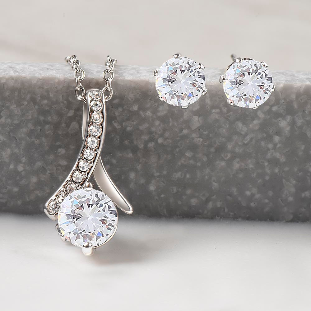 Ribbon white gold finish and cz crystal jewelry set.