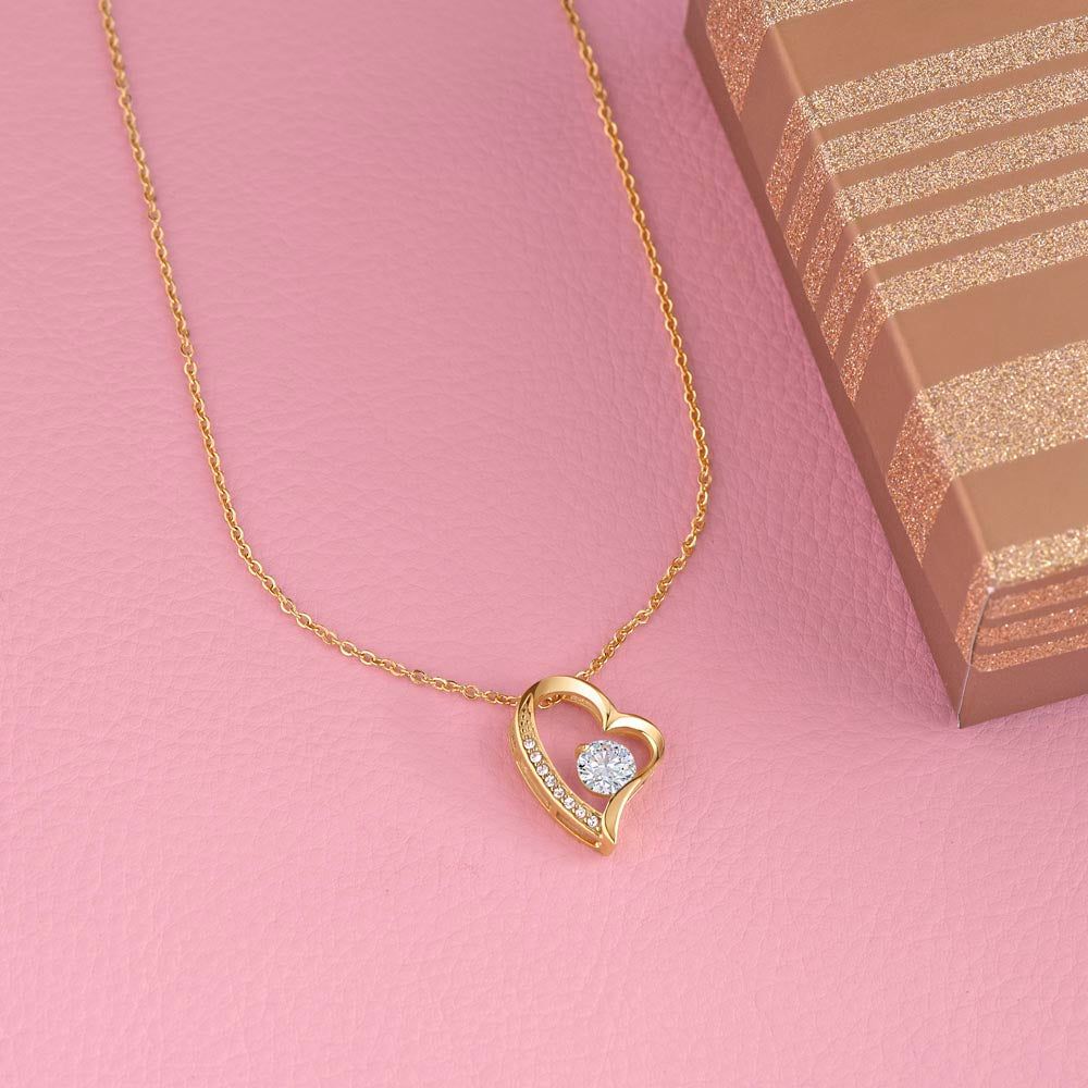 Heart white 14k gold or 18k yellow gold cz with smaller crystals necklace.