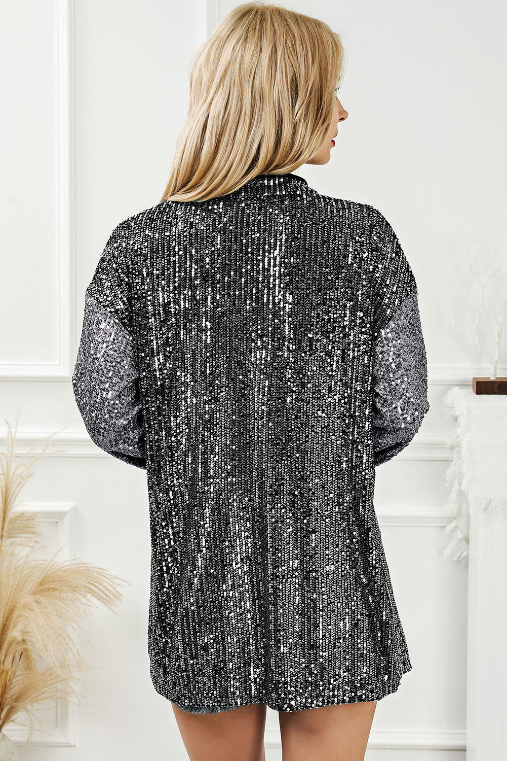 Sequin button-up pocketed long sleeve women’s top.