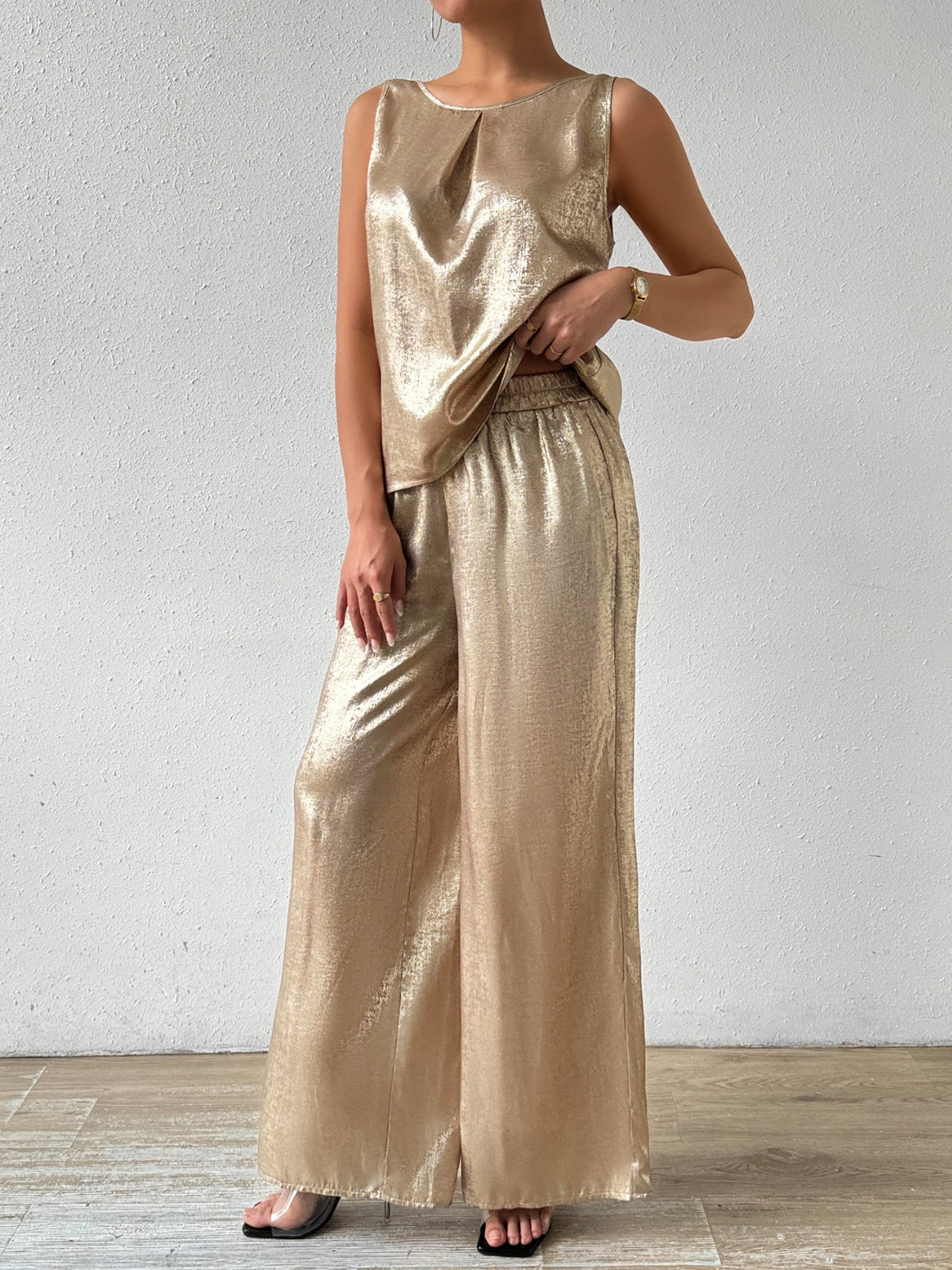 Golden women’s sleeveless two piece set.