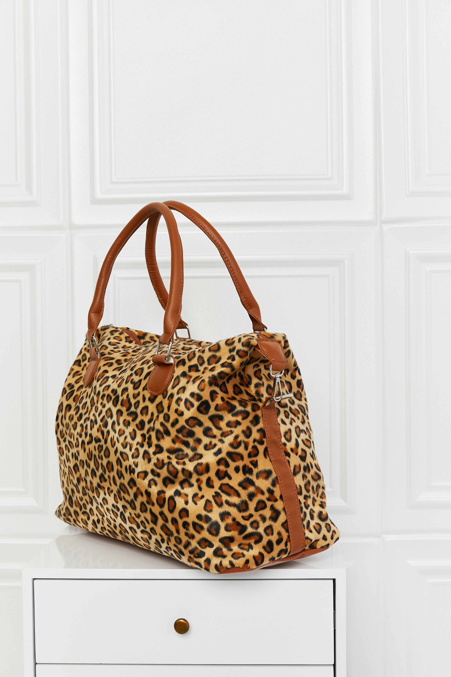 Faux fur animal brushed weekender handbag.