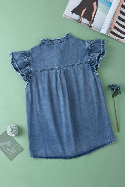 Denim button up women’s top.