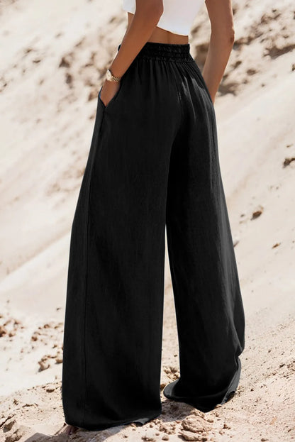 Drawstring denim pocketed women’s palazzo pants.