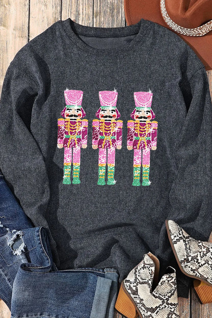 Holiday multi-color 3 nutcracker long sleeve women’s sweater.