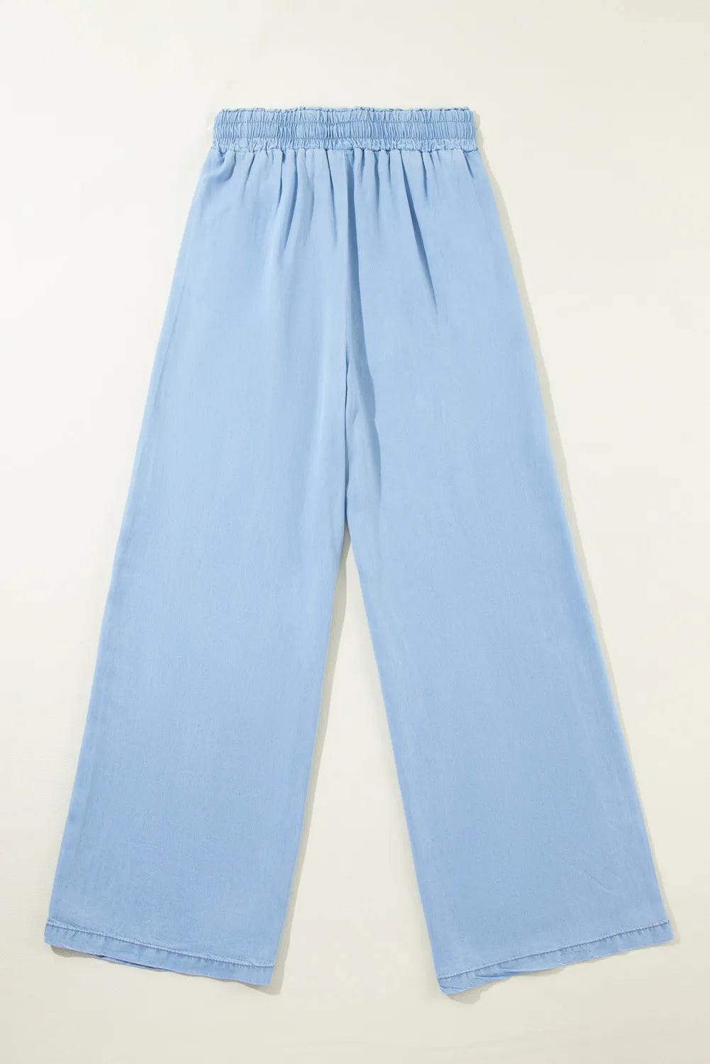 Drawstring denim pocketed women’s palazzo pants.