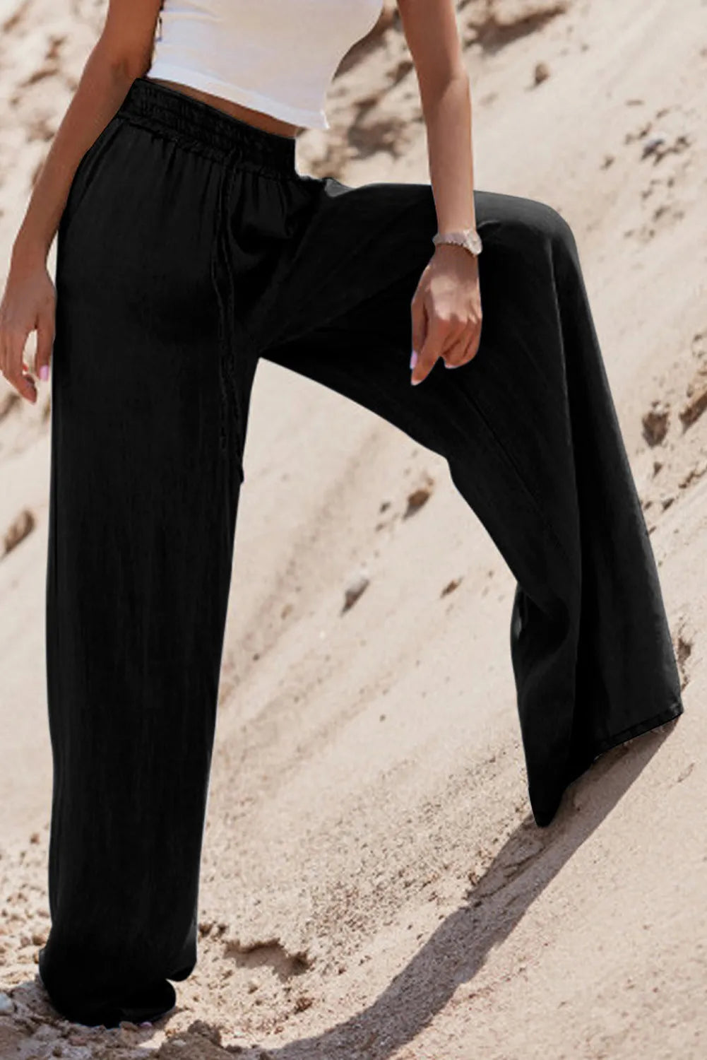 Drawstring denim pocketed women’s palazzo pants.