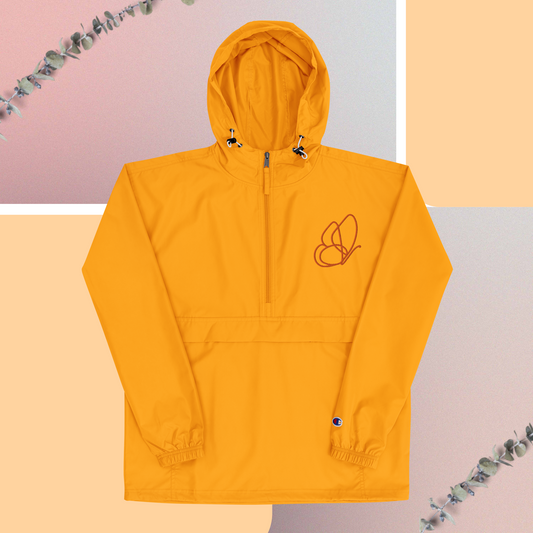 Orange women’s champion packable jacket.