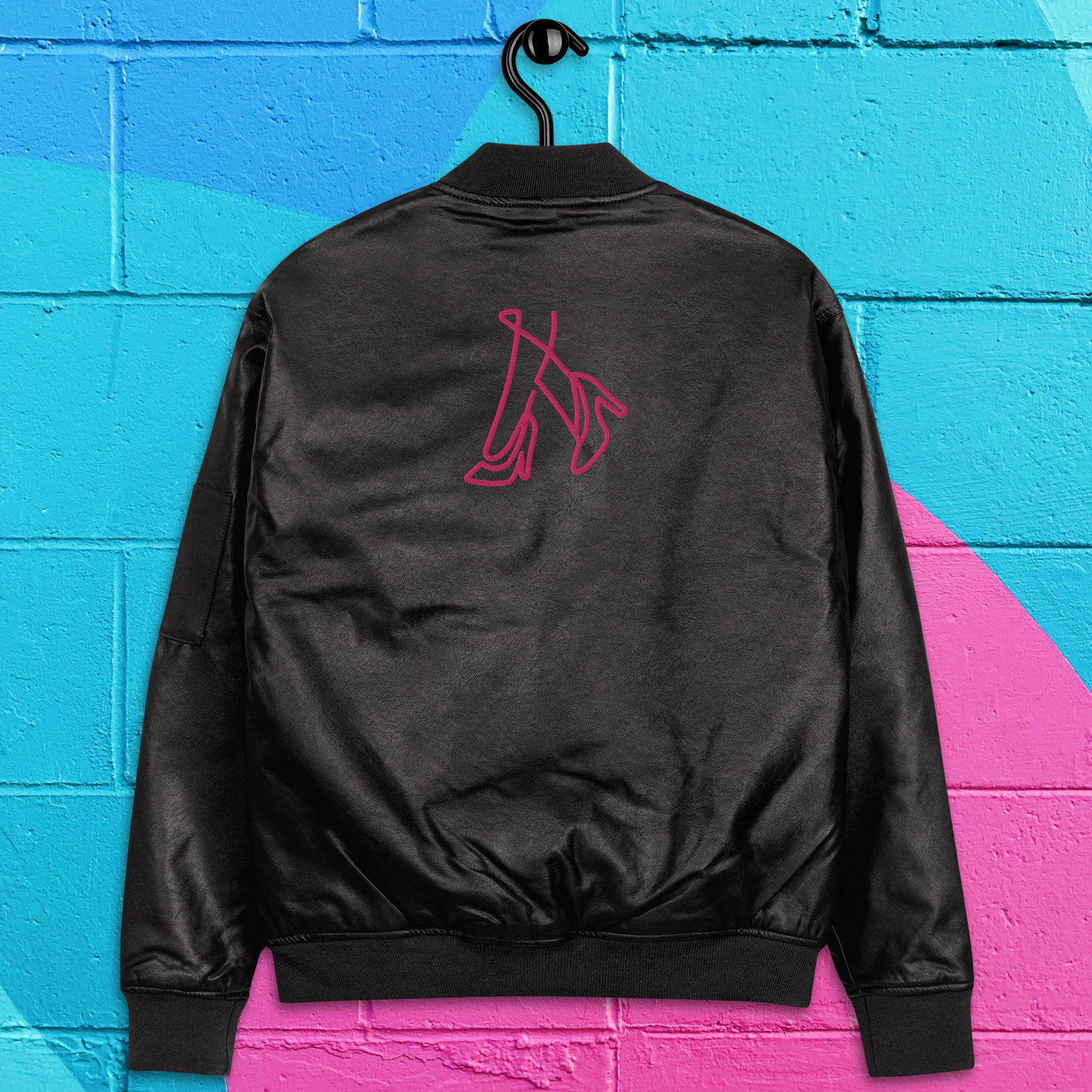 Leather black and hot pink women’s bomber jacket.