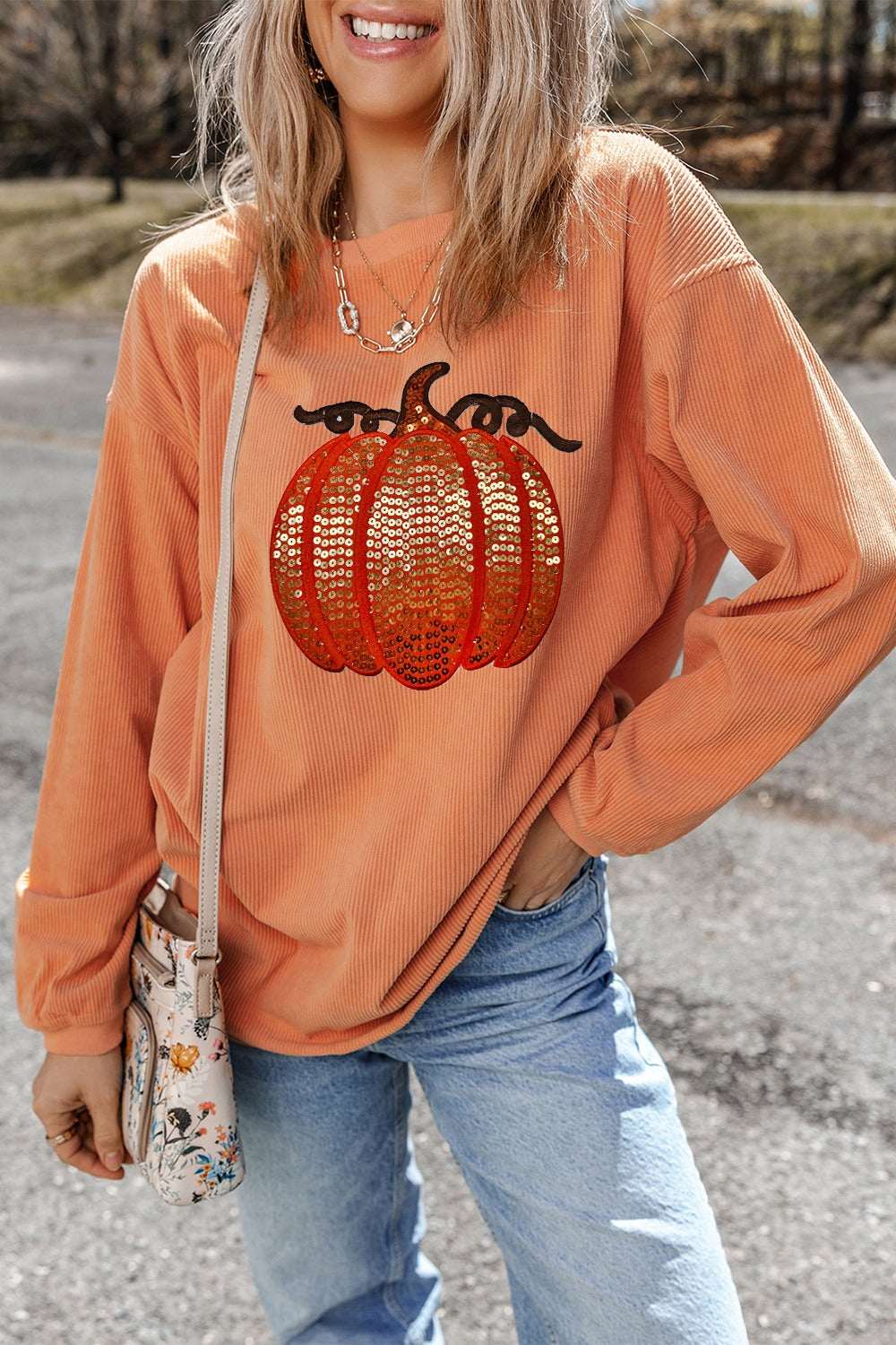 Pumpkin sequin women’s long sleeve sweatshirt.