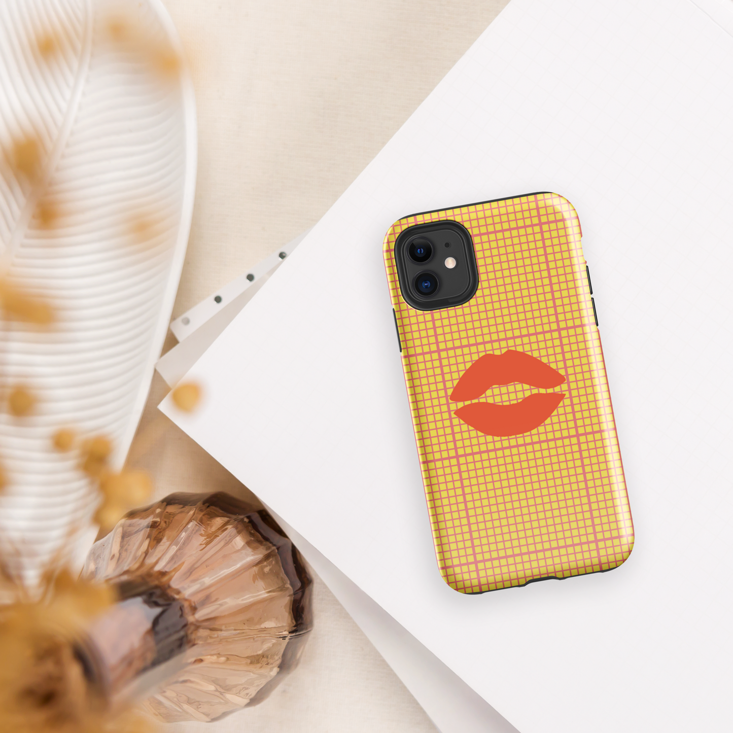 Yellow and multi-color tough case for iPhone®.