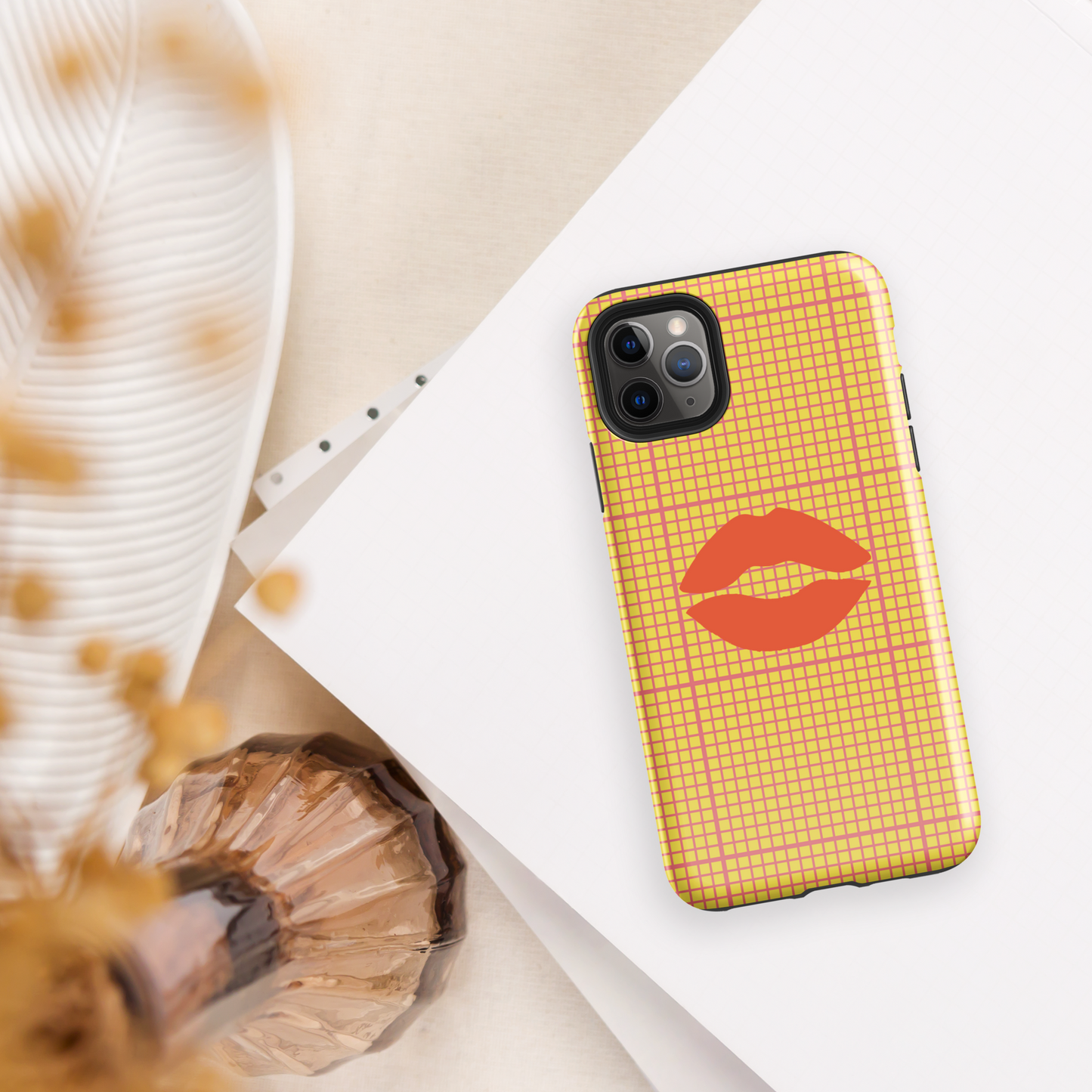 Yellow and multi-color tough case for iPhone®.