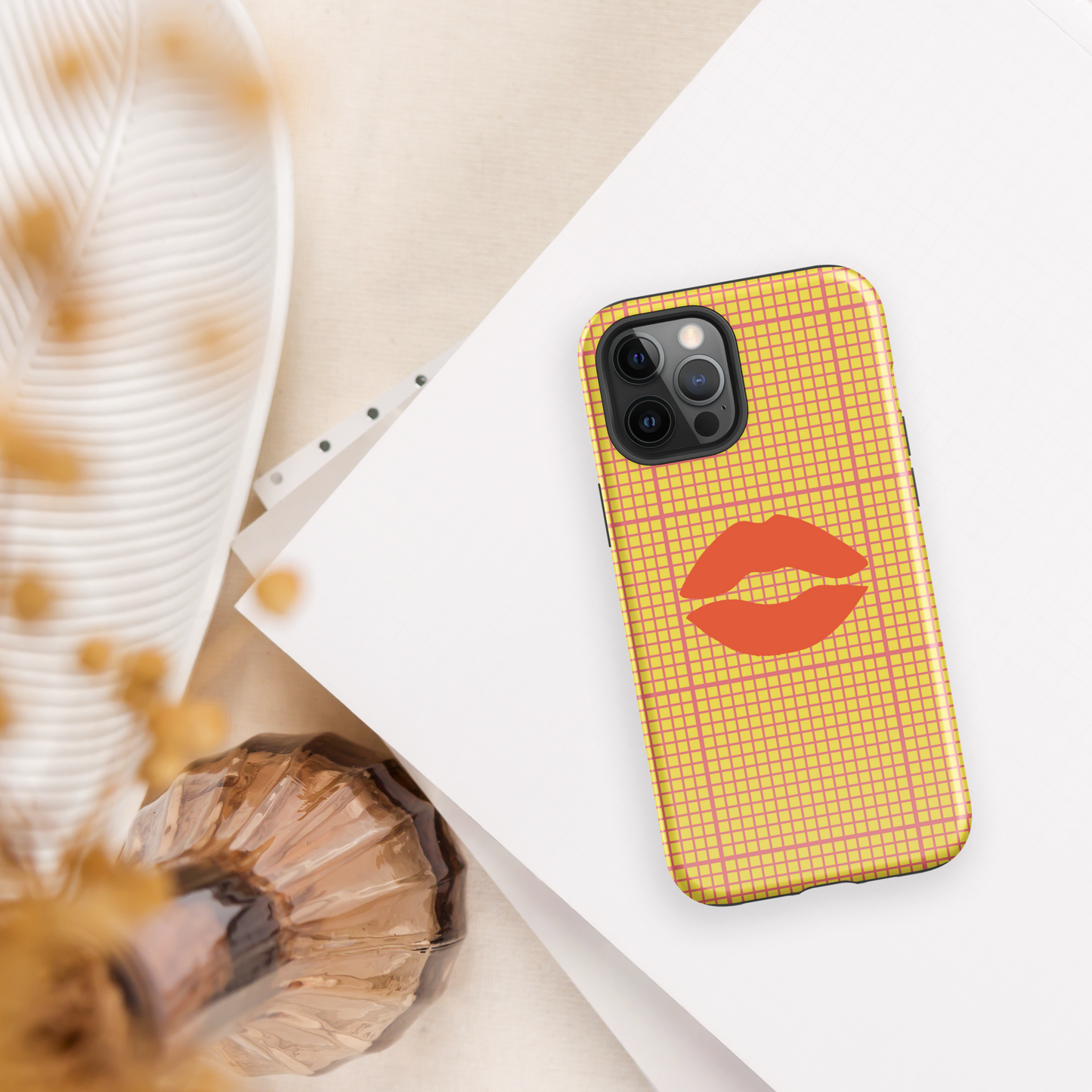 Yellow and multi-color tough case for iPhone®.