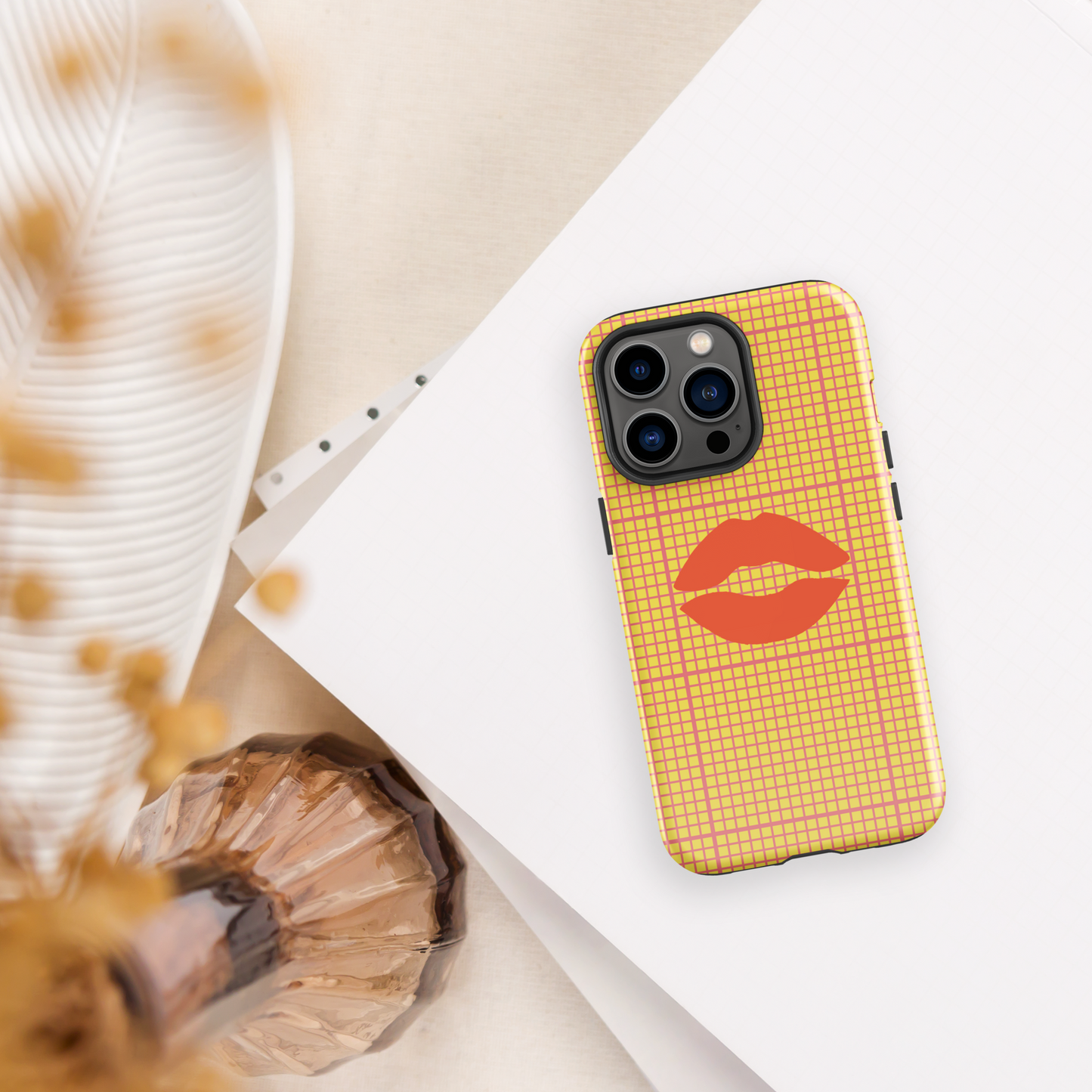 Yellow and multi-color tough case for iPhone®.