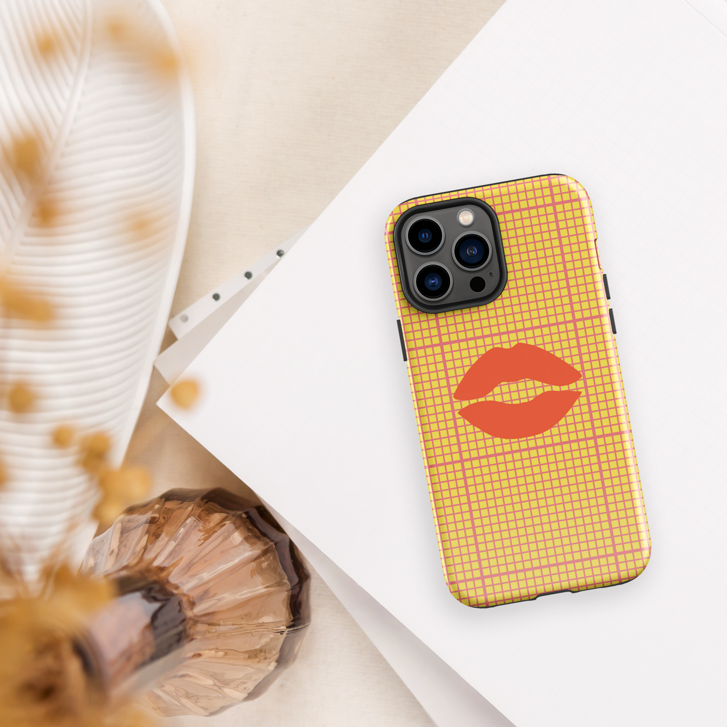 Yellow and multi-color tough case for iPhone®.