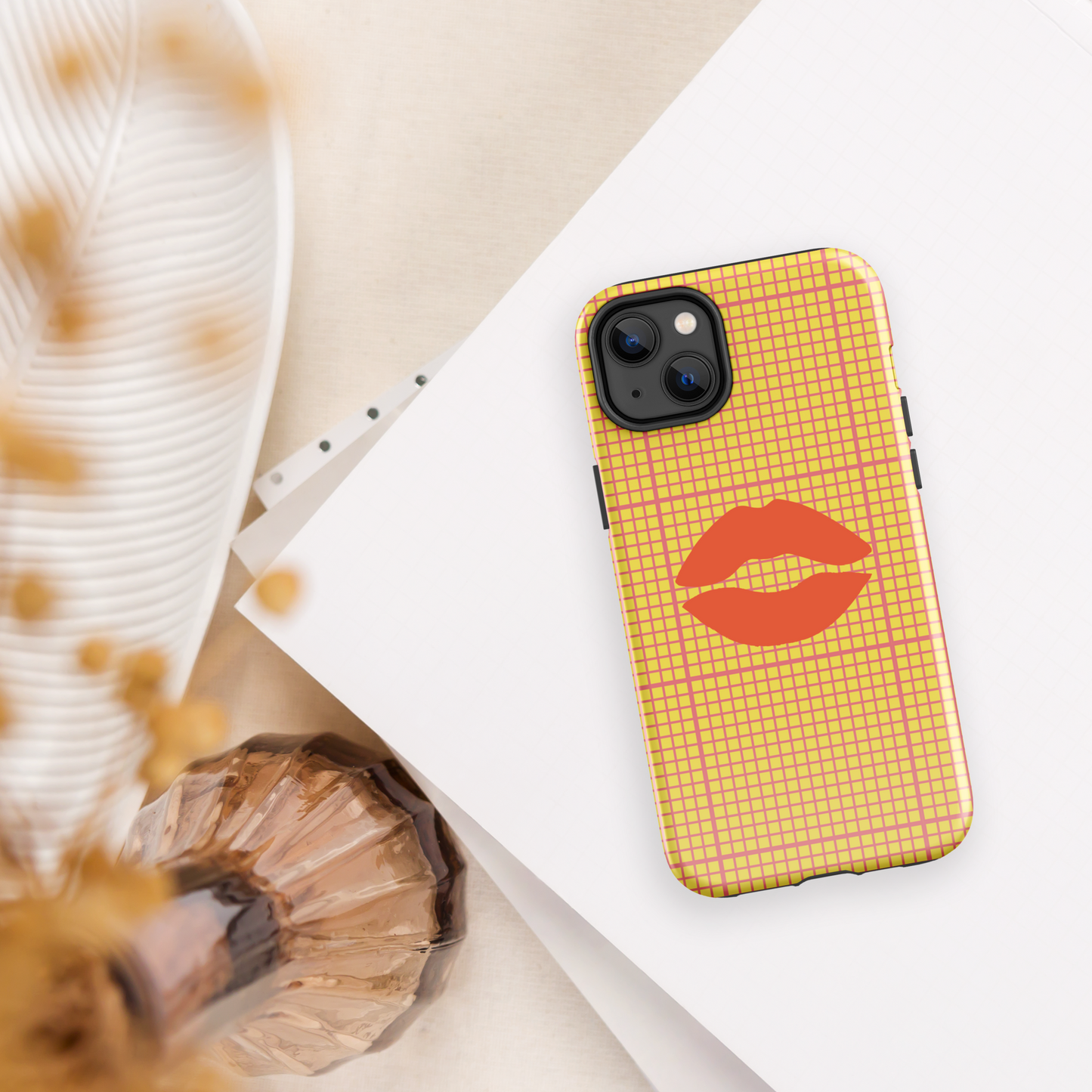 Yellow and multi-color tough case for iPhone®.