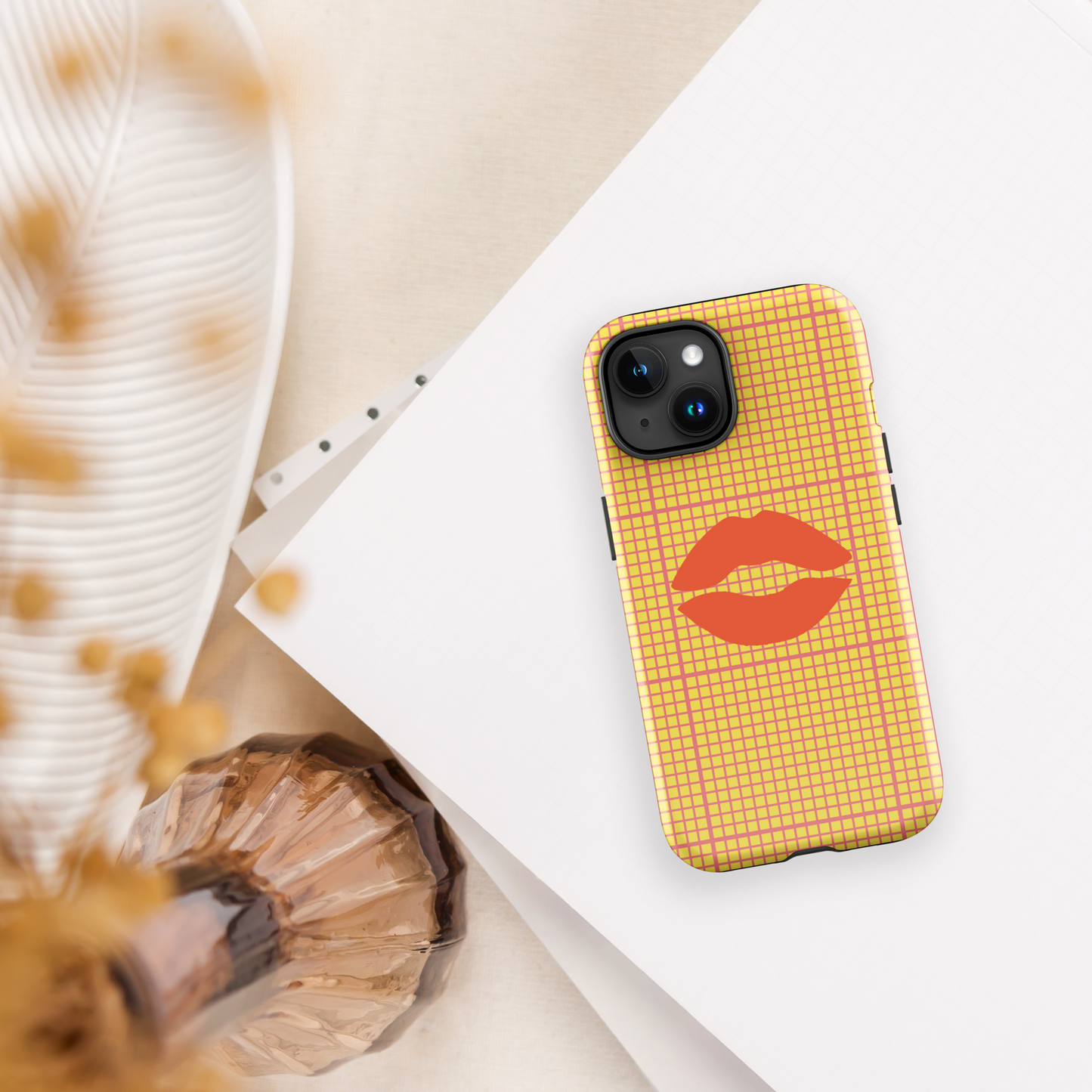 Yellow and multi-color tough case for iPhone®.