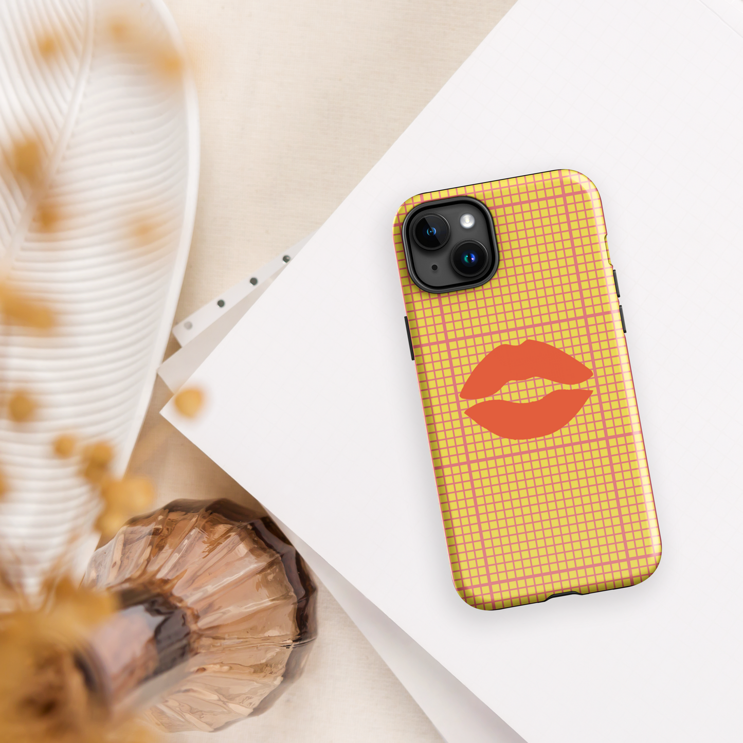 Yellow and multi-color tough case for iPhone®.