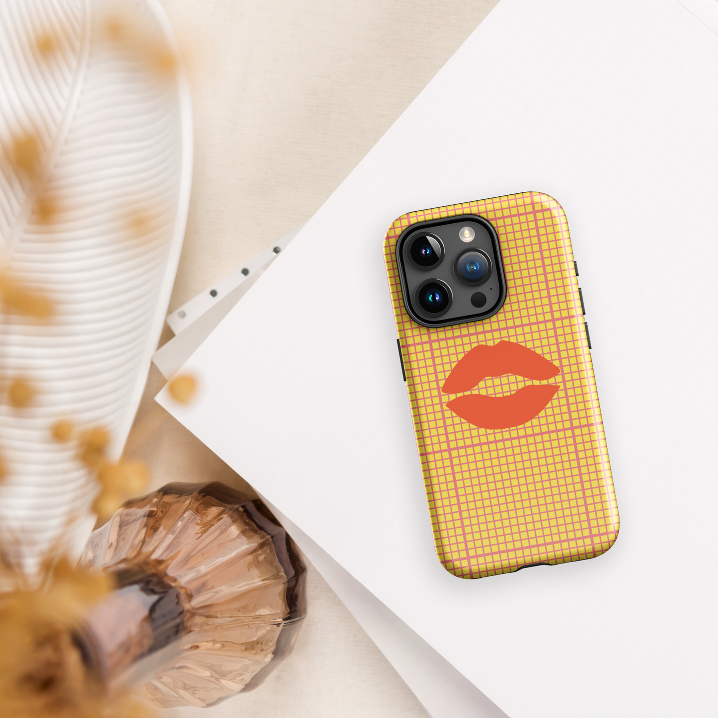 Yellow and multi-color tough case for iPhone®.