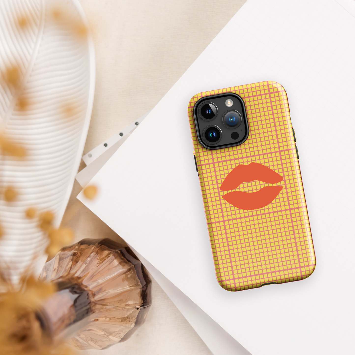 Yellow and multi-color tough case for iPhone®.