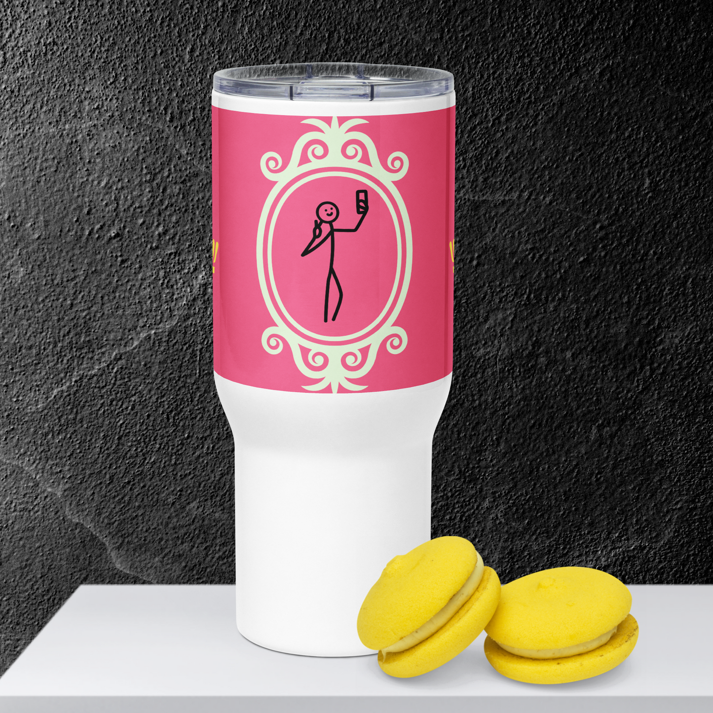 Hot pink selfie travel mug with a handle.