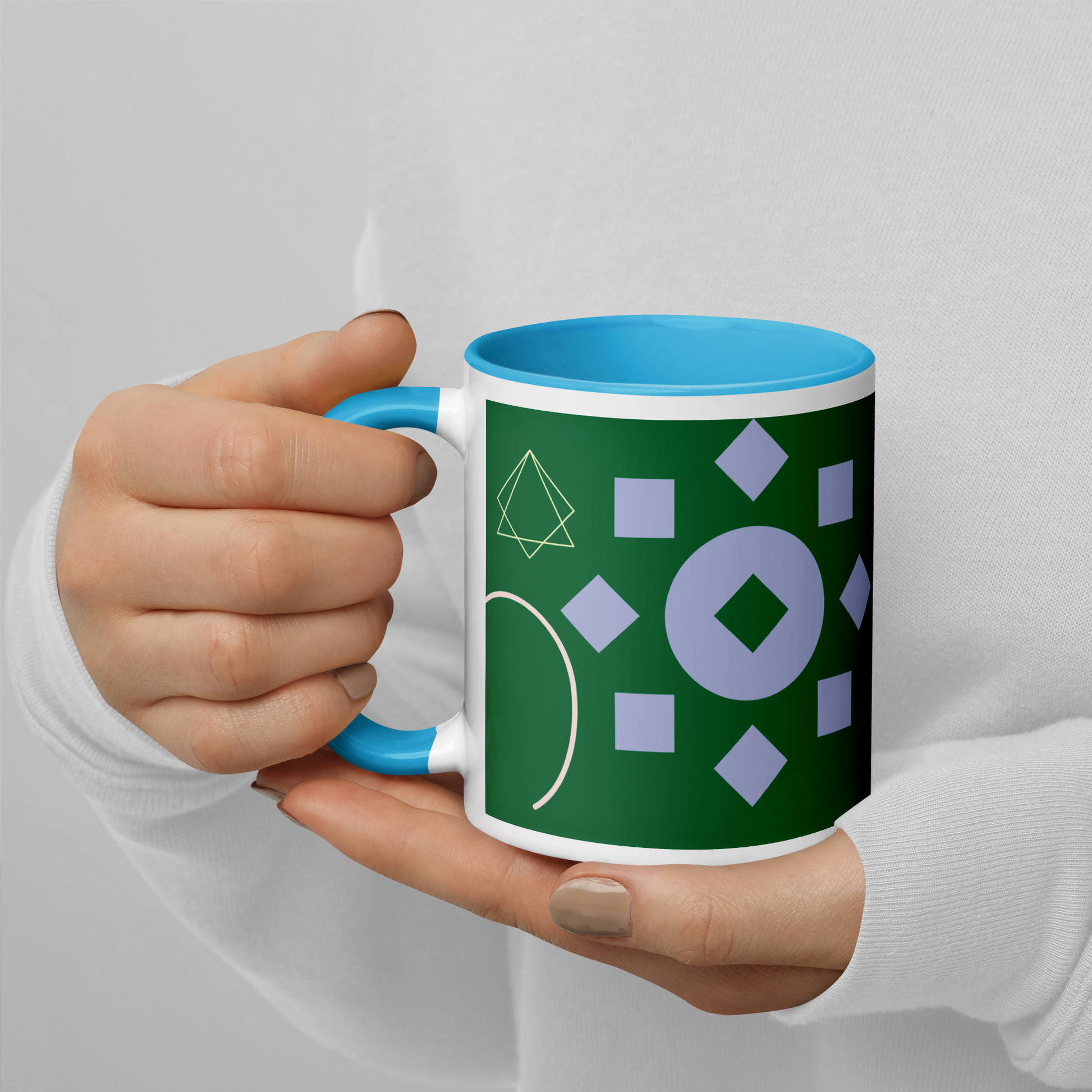 Green and multi-color mug with color inside.